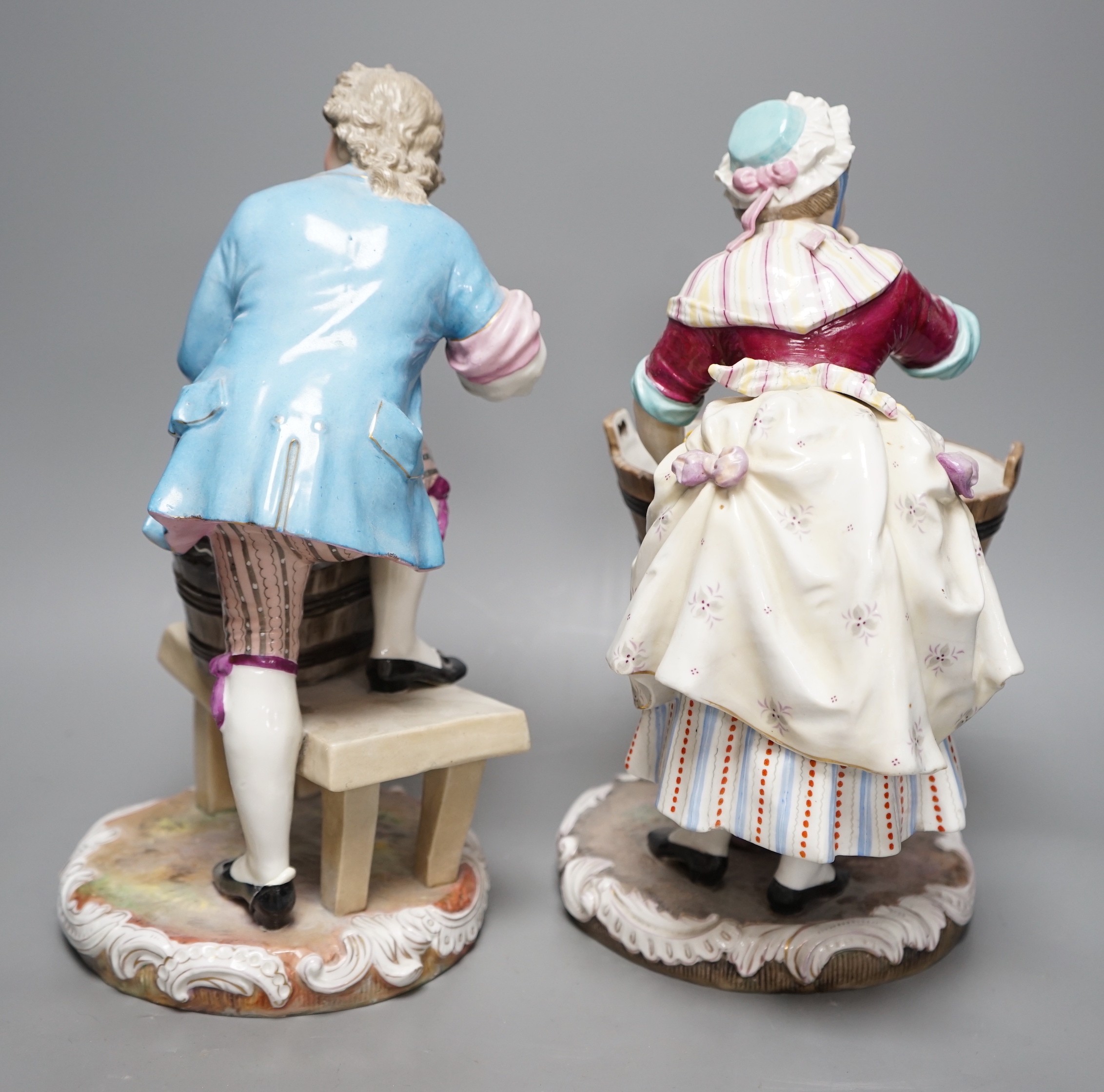 A pair of late 19th century Italian porcelain figures, 31cm
